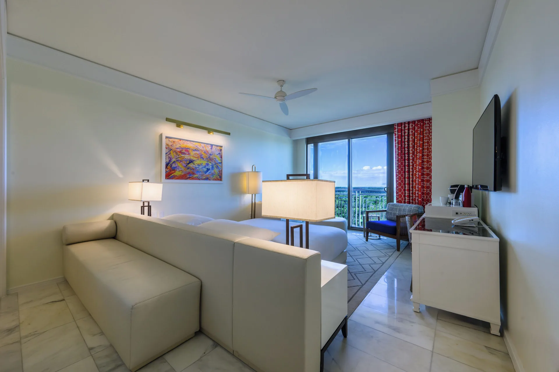 Fountain View Reserve room with king bed and sofa at Grand Hyatt Baha Mar.