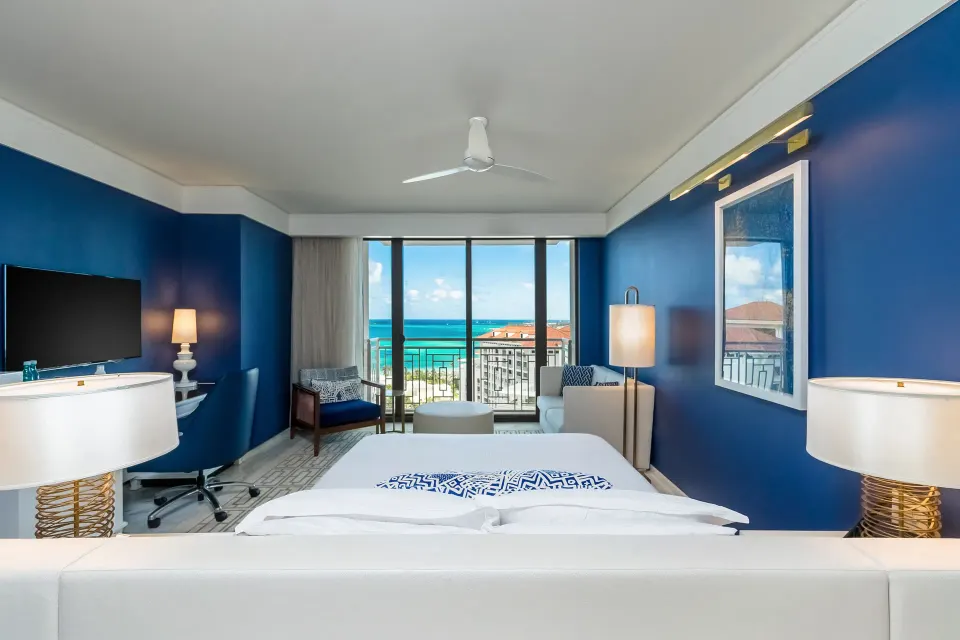 Ocean View king room with blue walls and balcony at Grand Hyatt Baha Mar.