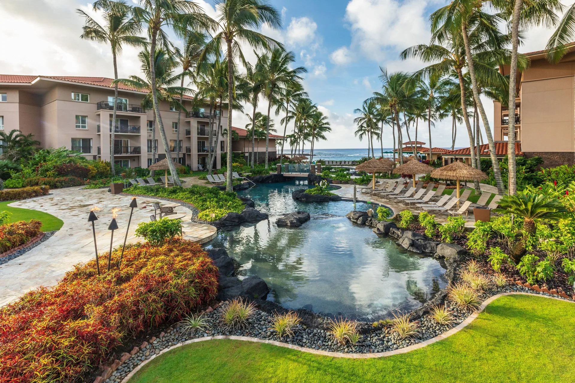 Marriott's Waiohai Beach Club villa resort on Poipu Beach with family-friendly pools and island style