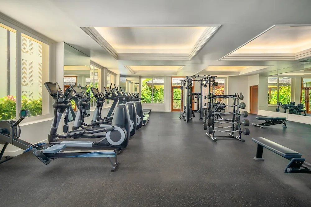 Cardio and weight machines in the fitness center at Grand Hyatt Kauai Resort and Spa and Spa.