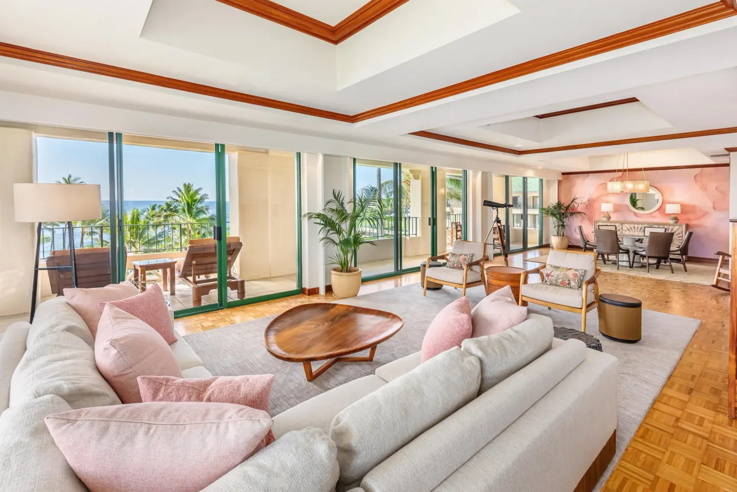 Expansive ocean-view suite with sofas and dining area at Grand Hyatt Kauai Resort and Spa and Spa.