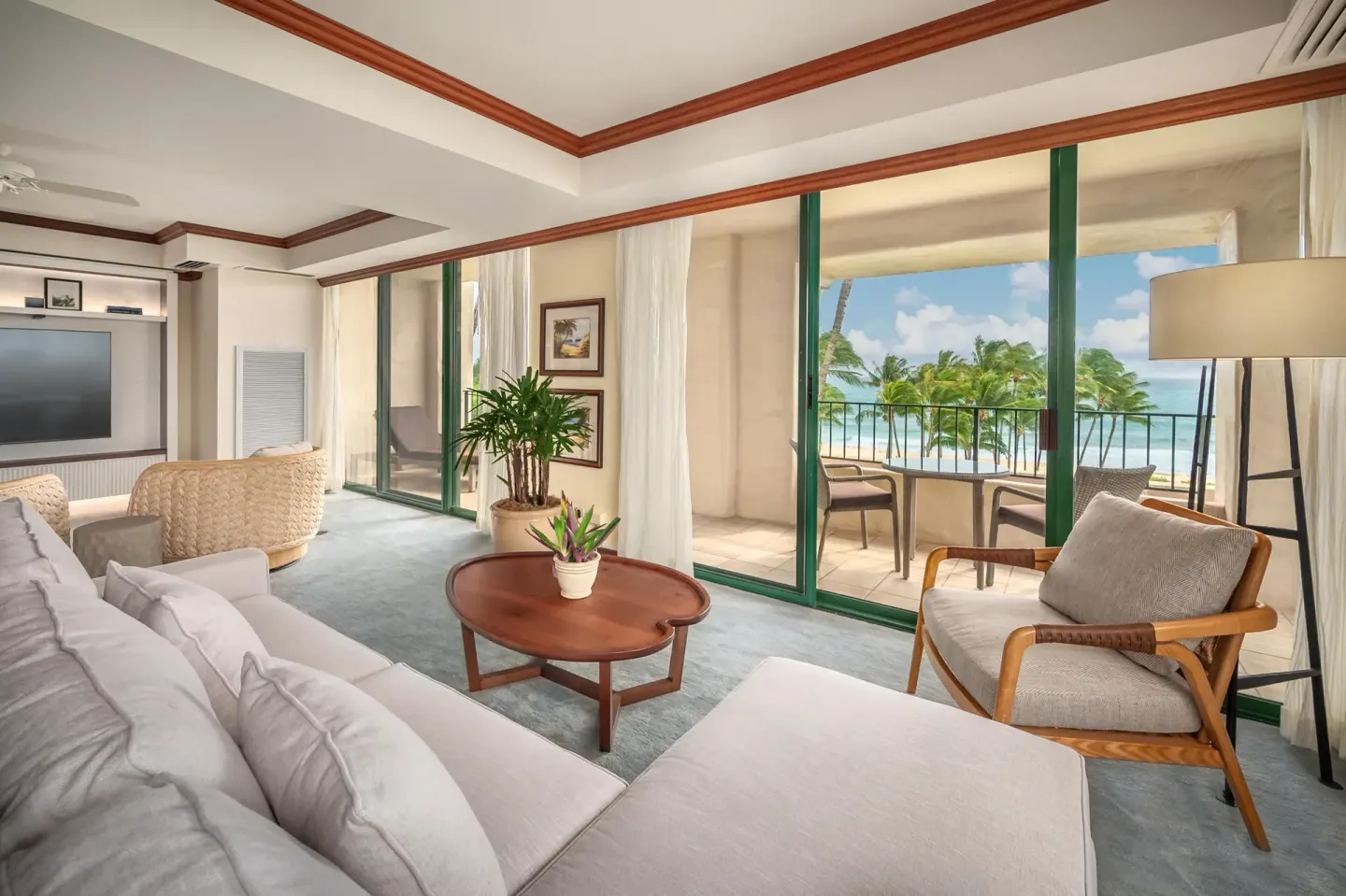 Grand Suite lounge with sofa, TV, and balcony seating at Grand Hyatt Kauai Resort and Spa and Spa.