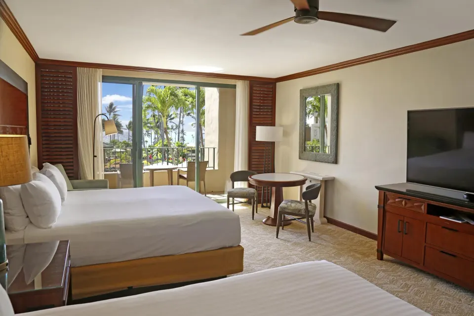 Partial ocean view room with two beds and balcony at Grand Hyatt Kauai Resort and Spa and Spa.