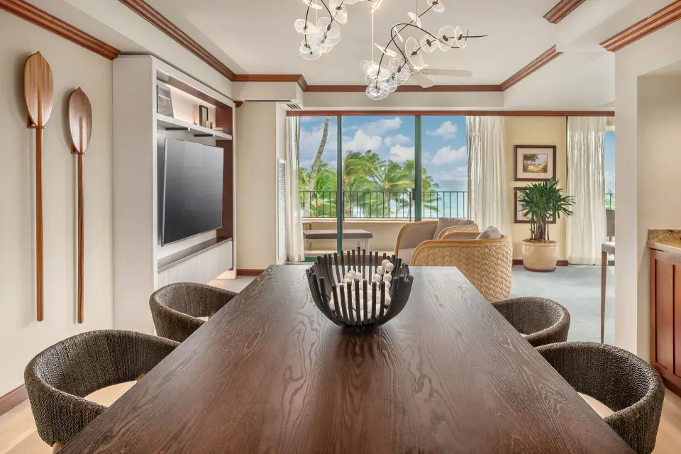 Royal Suite dining table and living room with ocean view at Grand Hyatt Kauai Resort and Spa and Spa.
