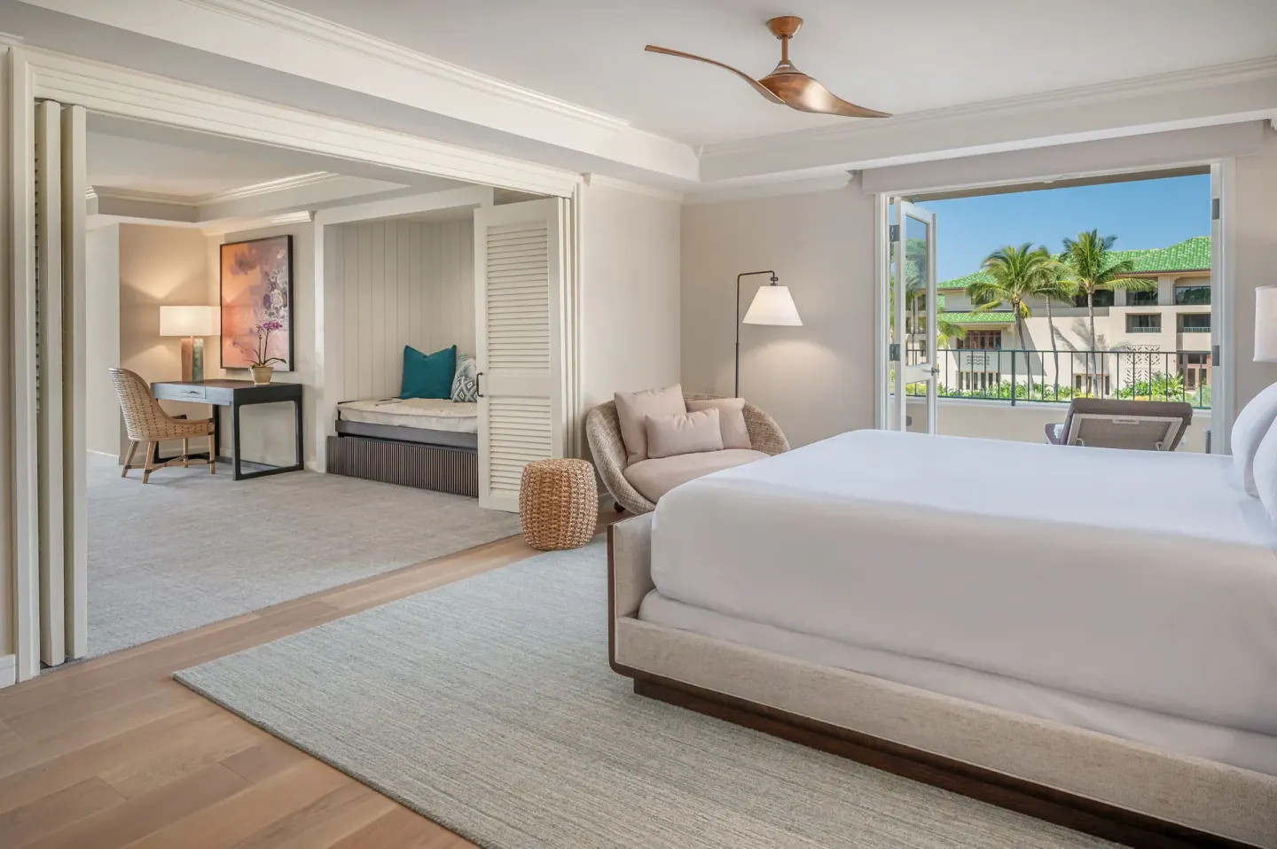 Royal Suite bedroom with king bed and balcony at Grand Hyatt Kauai Resort and Spa and Spa.
