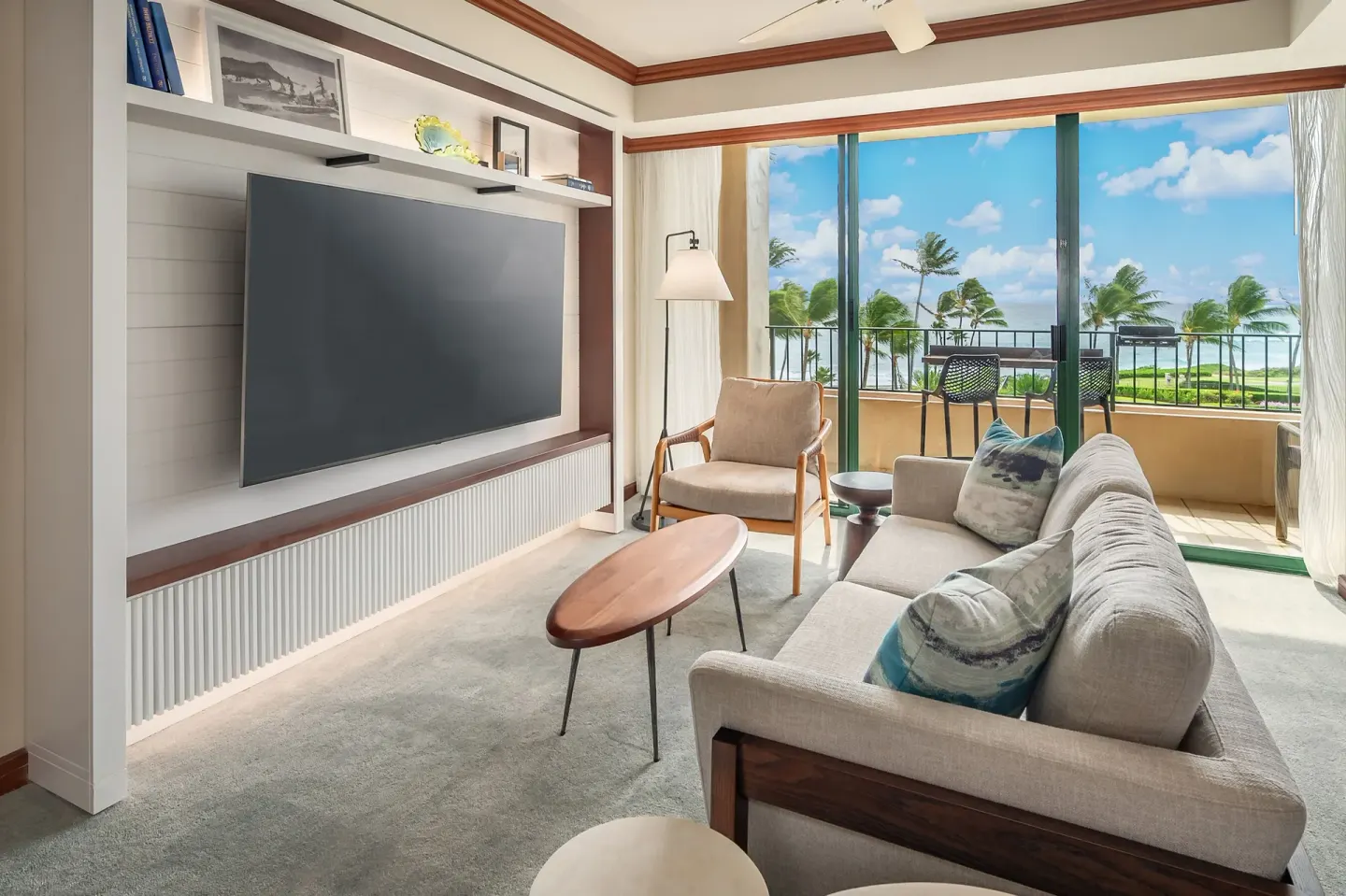 Ocean view suite living room with sofa and balcony at Grand Hyatt Kauai Resort and Spa and Spa.