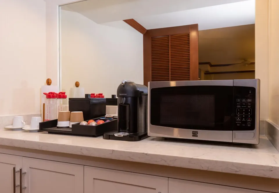 Pool Suite refreshment counter with coffee maker and microwave at Grand Hyatt Kauai Resort and Spa and Spa.