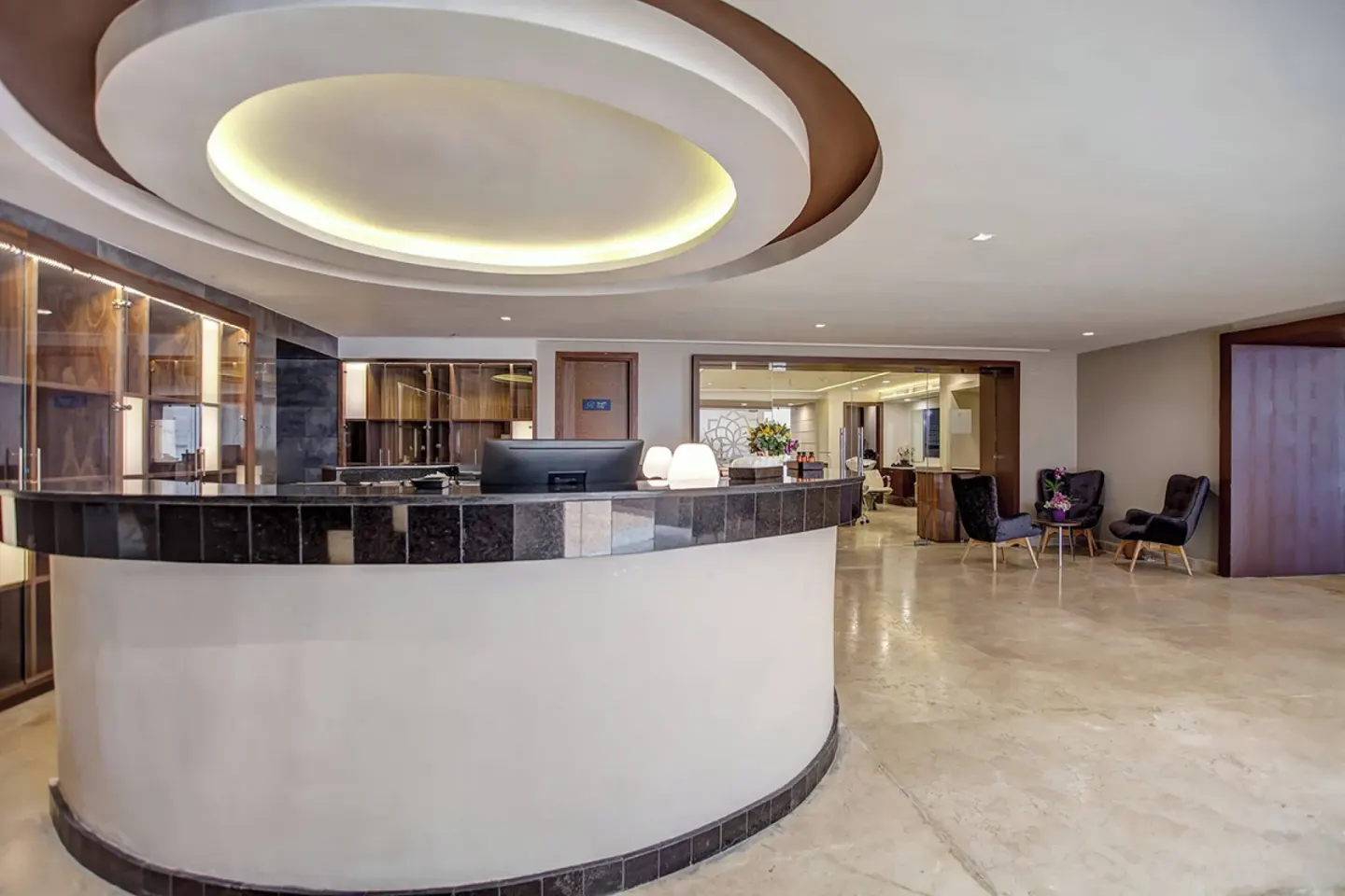 Curved reception counter and lounge seating at Grand Lido Negril Au-Naturel.