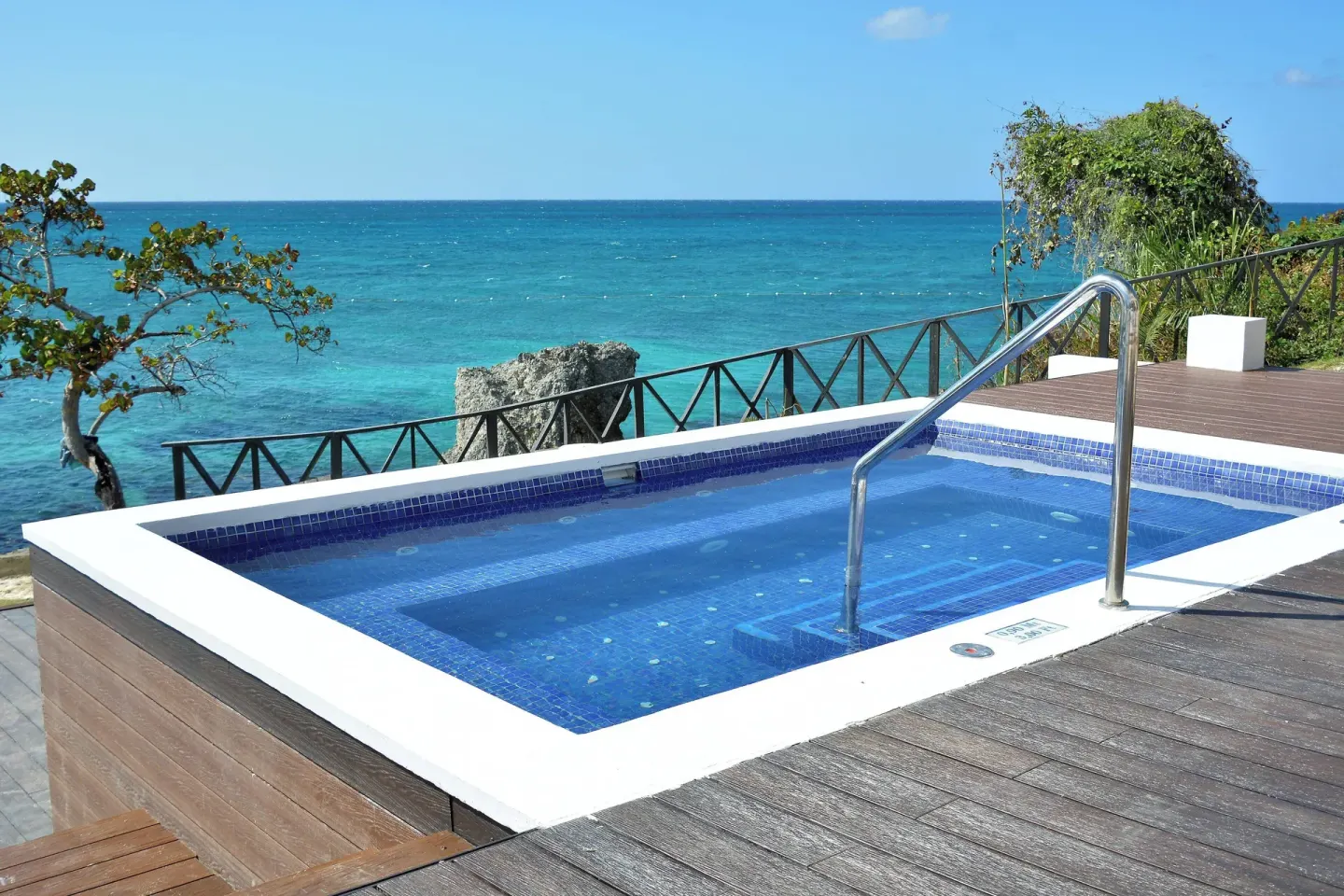 Oceanfront plunge pool with turquoise sea views at Grand Lido Negril Au-Naturel.