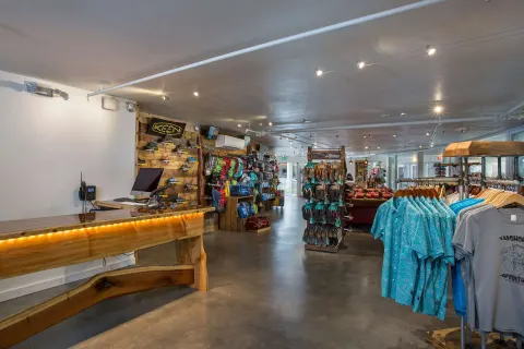 A resort shop displays clothing and outdoor gear at Grand Naniloa Hotel Hilo.