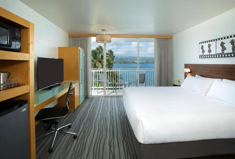 Oceanfront king room with lanai and bay view at Grand Naniloa Hotel Hilo.