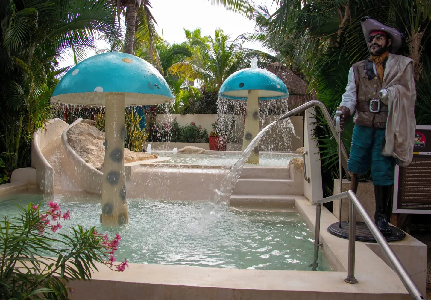 Children’s water play area with mushroom fountains at Grand Oasis Cancun.
