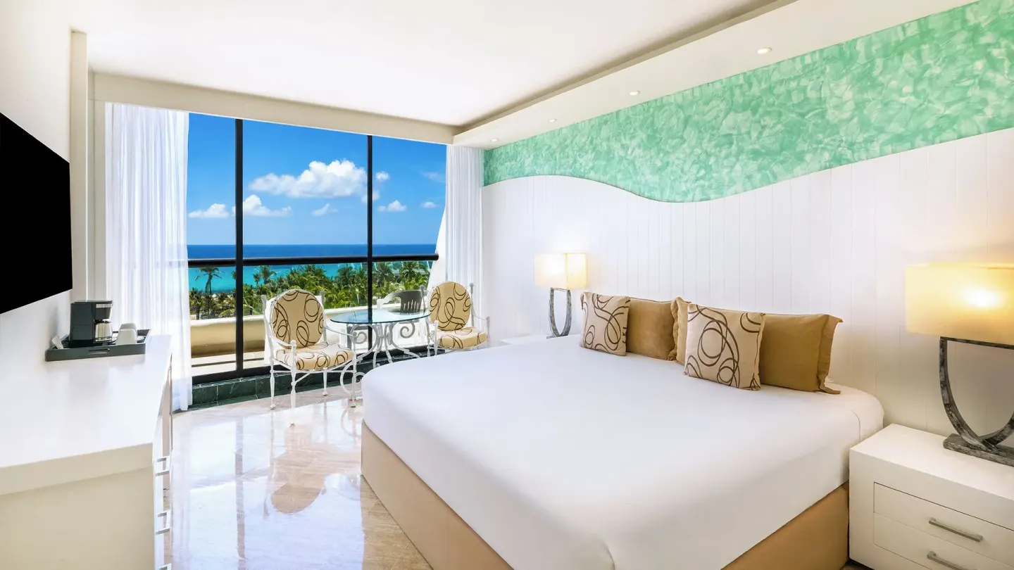 Grand Ocean View king room with balcony ocean view at Grand Oasis Cancun.