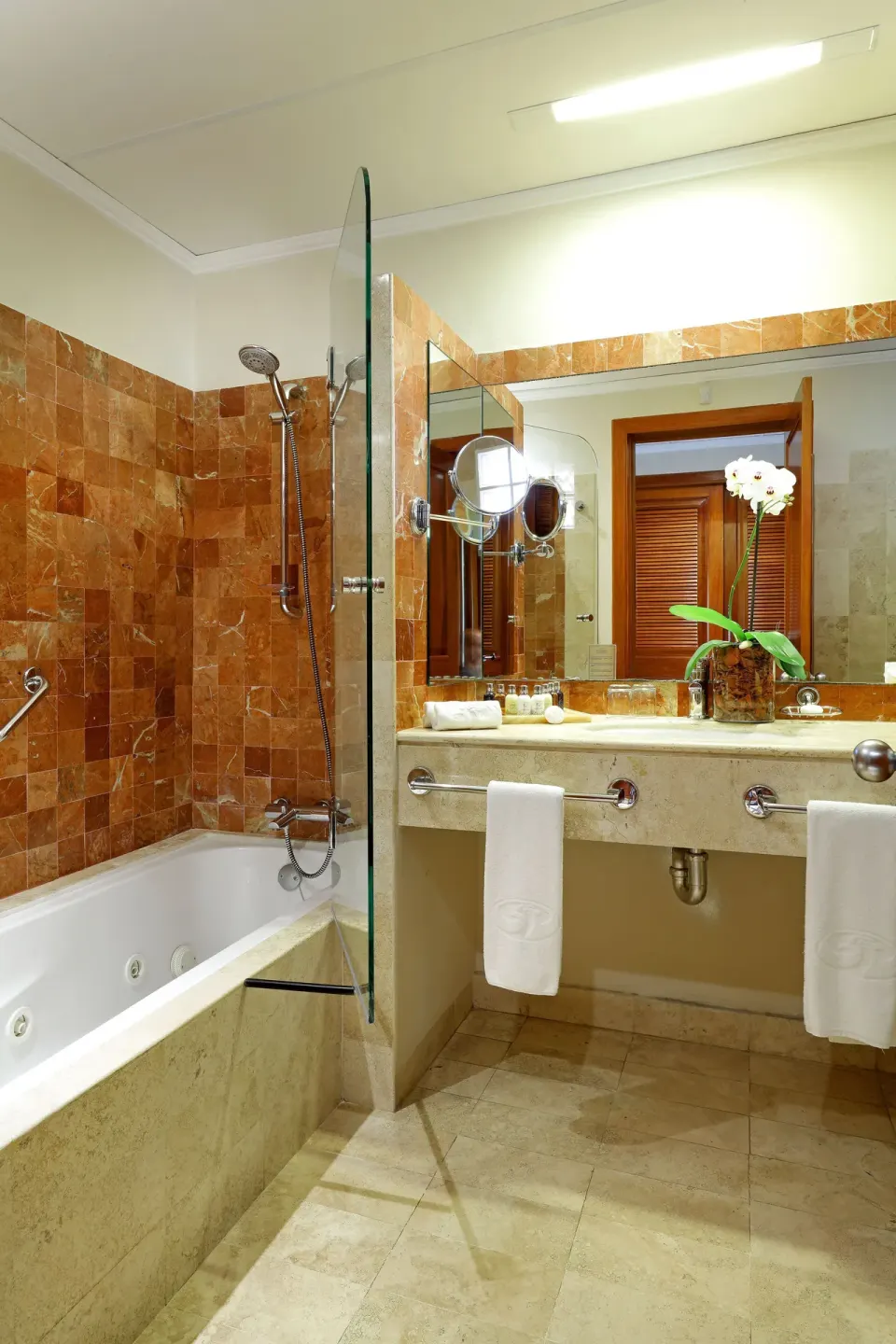 Bathroom with bathtub, shower and double sink at Grand Palladium Colonial Resort & Spa