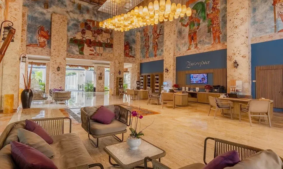 Resort lobby seating and check-in area at Grand Palladium Colonial Resort & Spa