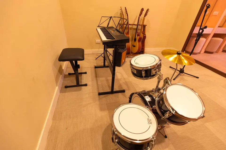 Small rehearsal space with drum kit, keyboards and guitars at Grand Palladium Colonial Resort & Spa