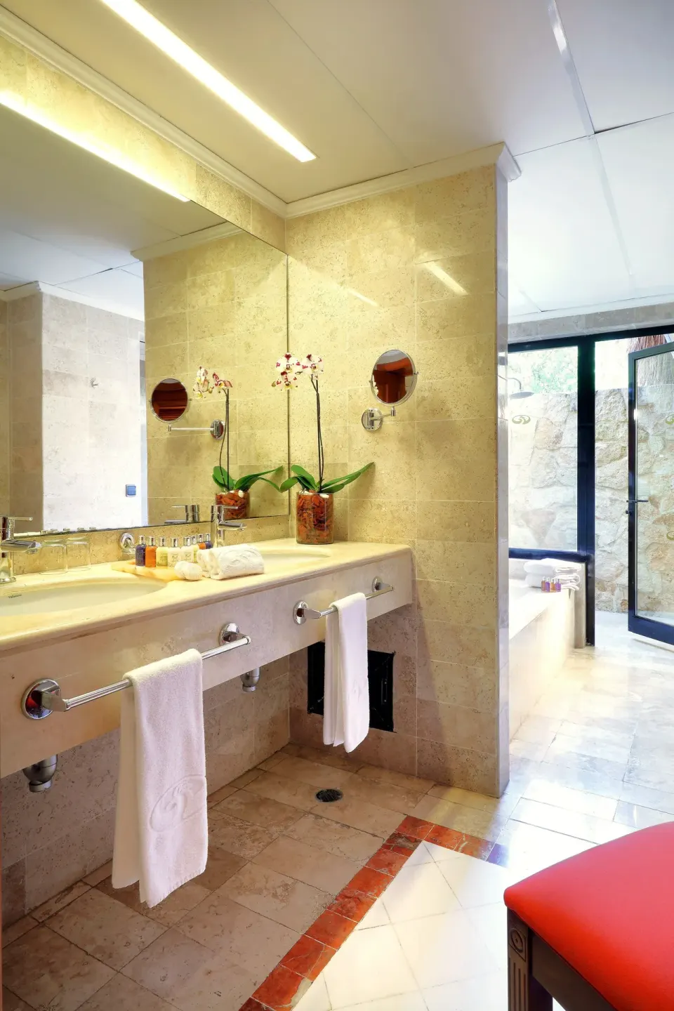Double vanity and mirror in a hotel bathroom at Grand Palladium Colonial Resort & Spa