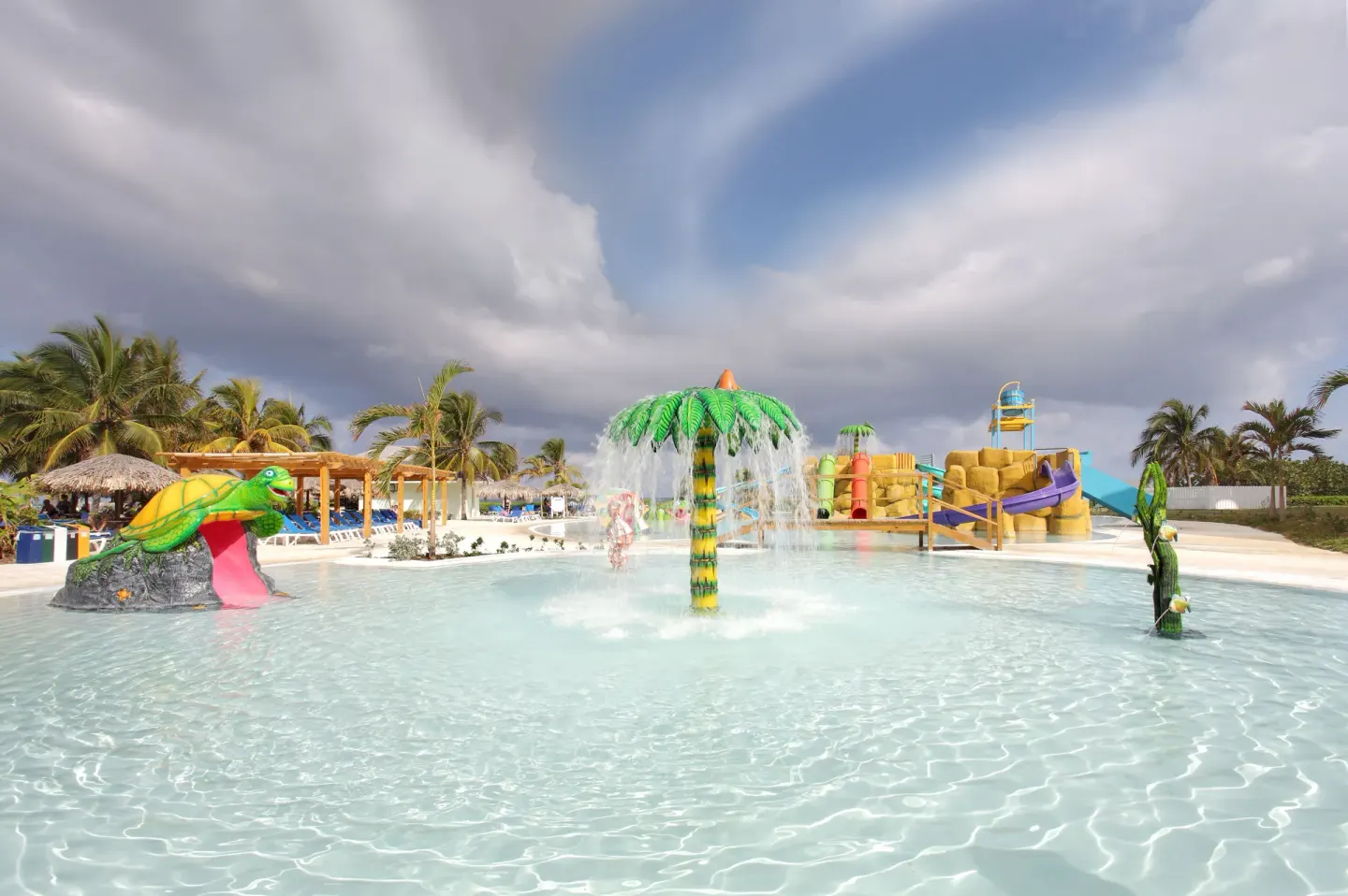 Children's splash pool with slides and water sprays at Grand Palladium Jamaica Resort & Spa.