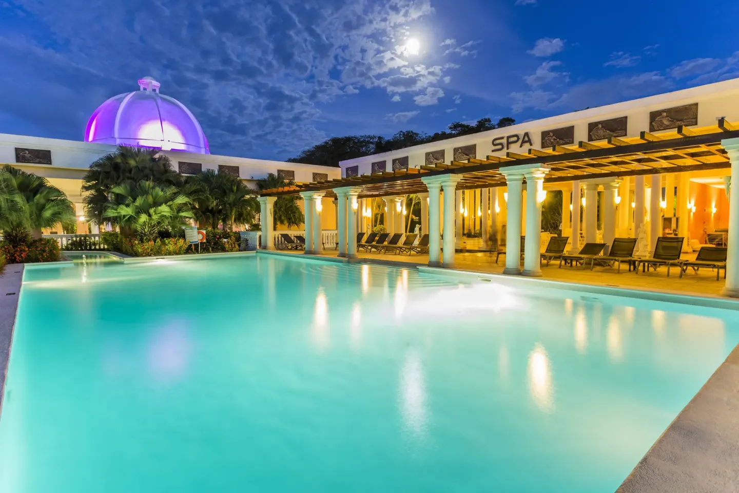 Night spa pool with glowing dome at Grand Palladium Jamaica Resort & Spa.