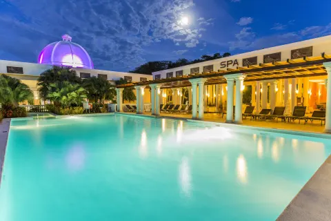 Night spa pool with glowing dome at Grand Palladium Jamaica Resort & Spa.