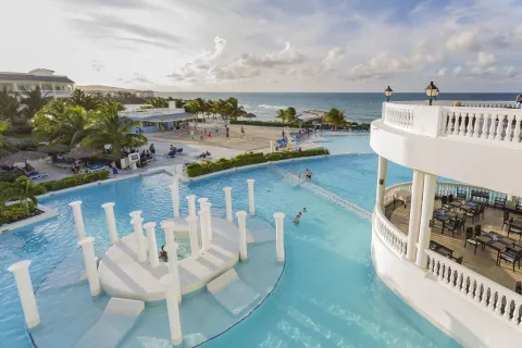 Large oceanfront pool and terrace at Grand Palladium Jamaica Resort & Spa.