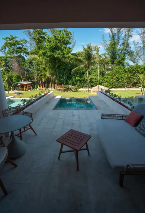 Shaded terrace with plunge pool and garden view at Grand Palladium Jamaica Resort & Spa.