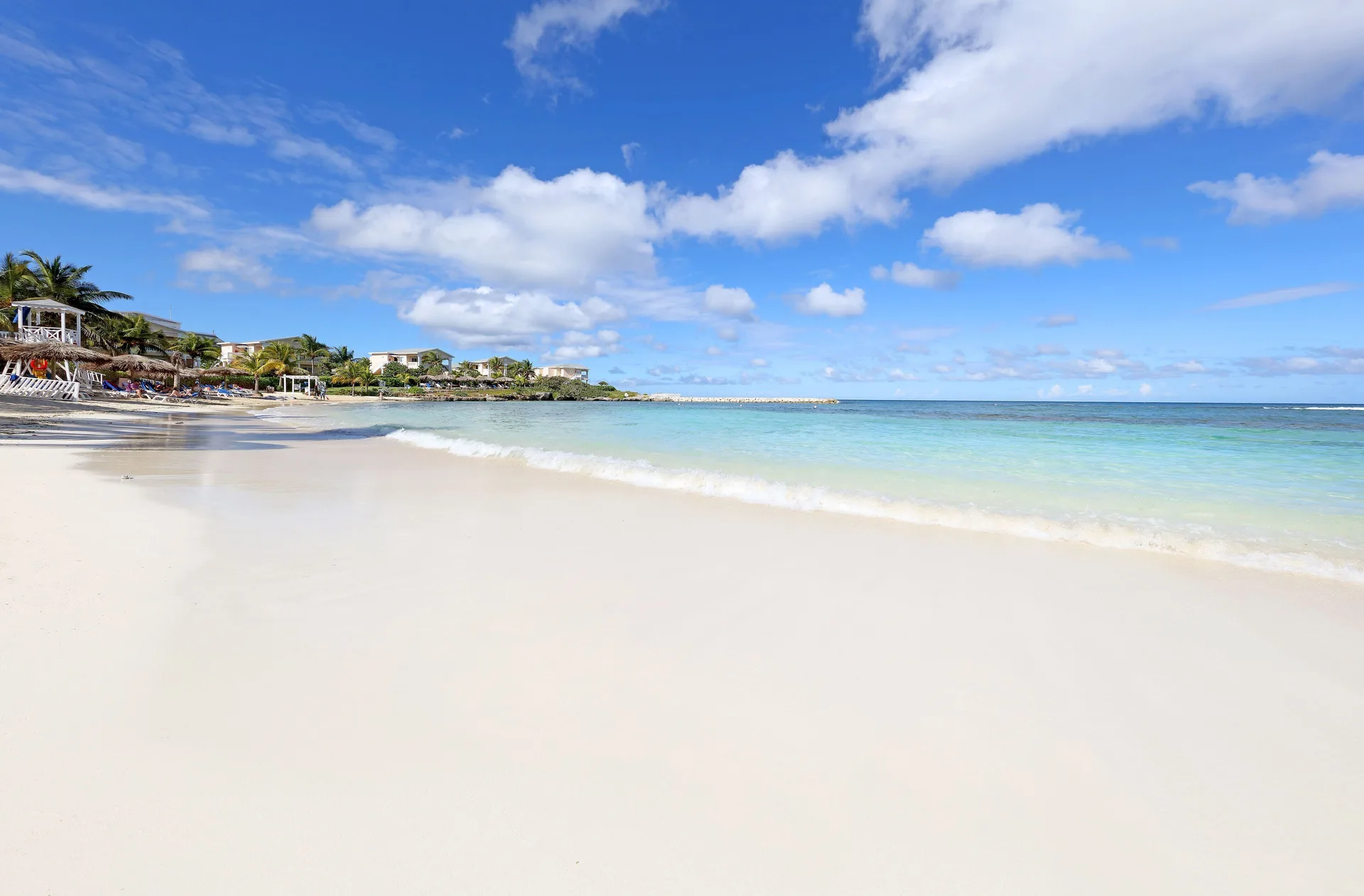 White sand beach and turquoise water at Grand Palladium Jamaica Resort & Spa.