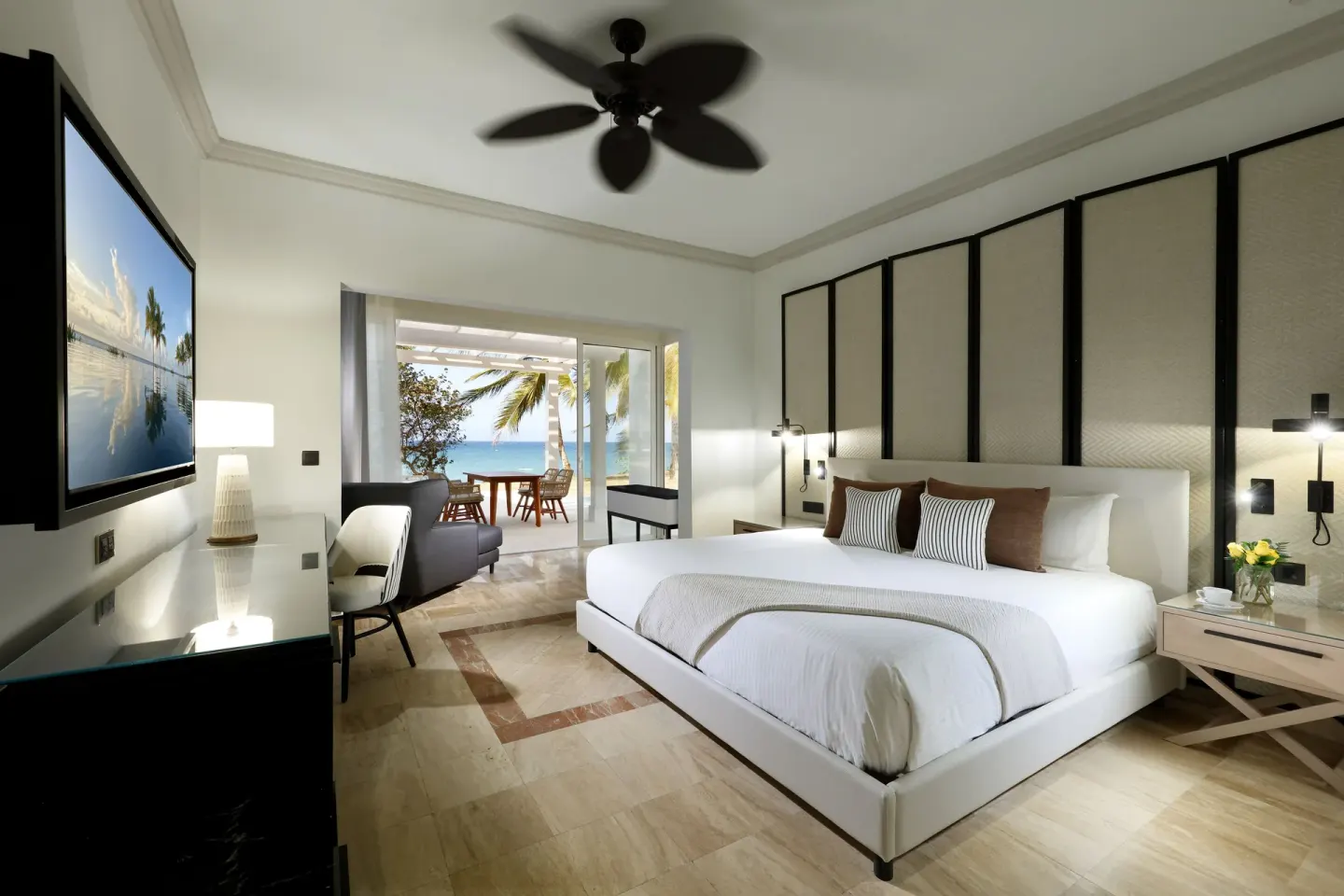 Junior Suite Poolside king bed with terrace view at Grand Palladium Jamaica Resort & Spa.