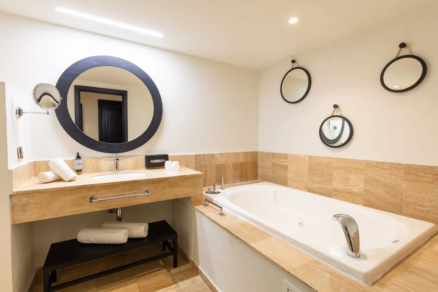 Junior Suite bathroom vanity and tub at Grand Palladium Jamaica Resort & Spa.
