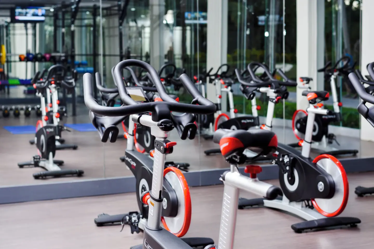 Stationary bikes reflected in mirrors at Grand Palladium Palace Resort Spa & Casino.
