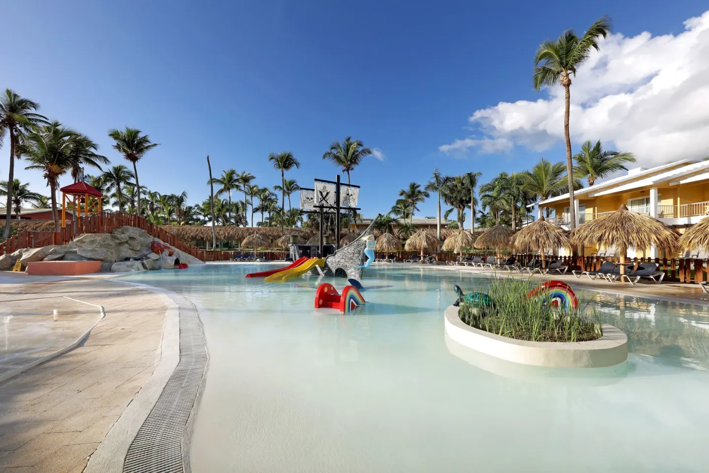 Children’s water play pool with slides at Grand Palladium Punta Cana Resort & Spa.
