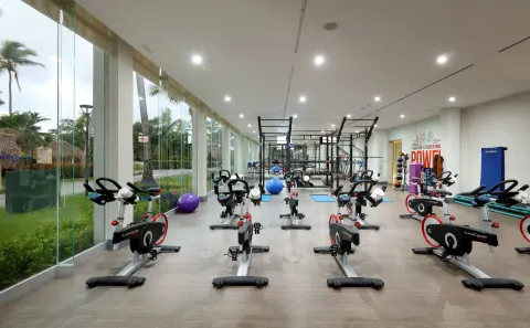 Fitness room with spin bikes and exercise equipment at Grand Palladium Punta Cana Resort & Spa.