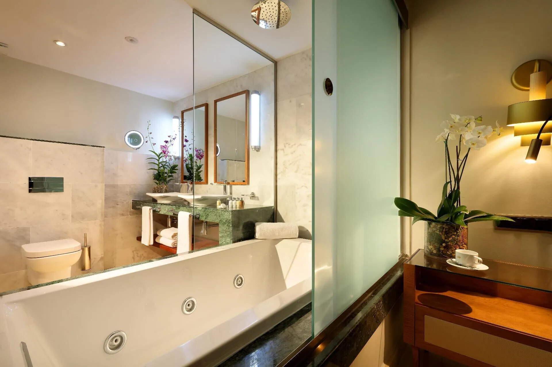 Deluxe Garden View Room bathroom with jetted tub at Grand Palladium Punta Cana Resort & Spa.