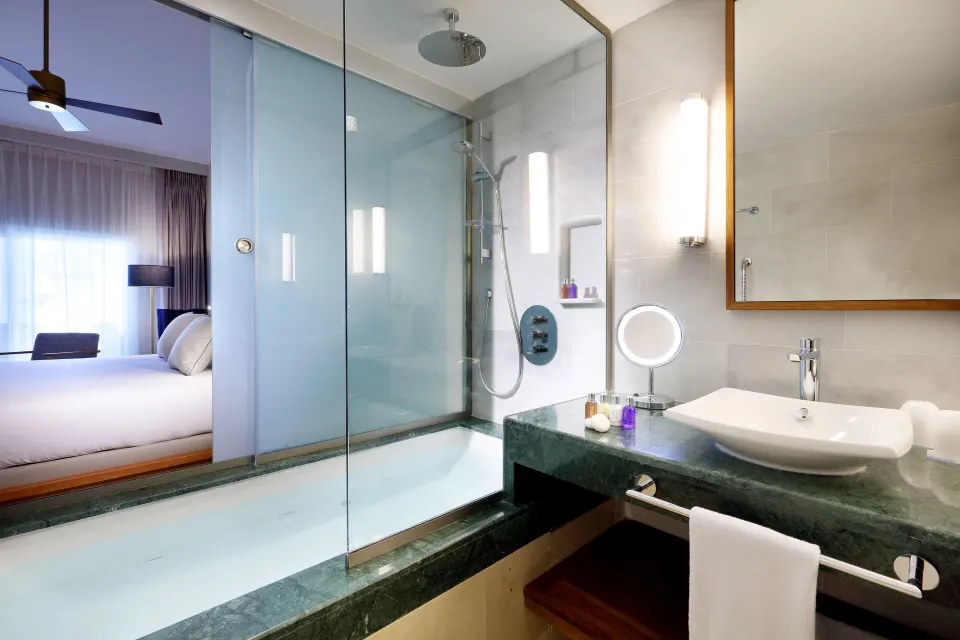 Deluxe Garden View bathroom vanity and shower at Grand Palladium Punta Cana Resort & Spa.