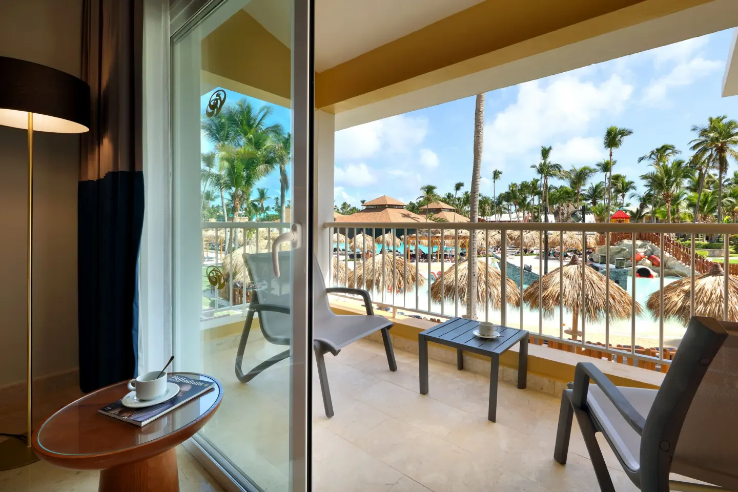 Deluxe Poolside balcony with pool view at Grand Palladium Punta Cana Resort & Spa.