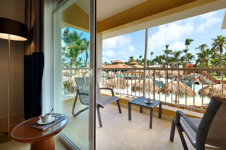 Deluxe Poolside balcony with pool view at Grand Palladium Punta Cana Resort & Spa.