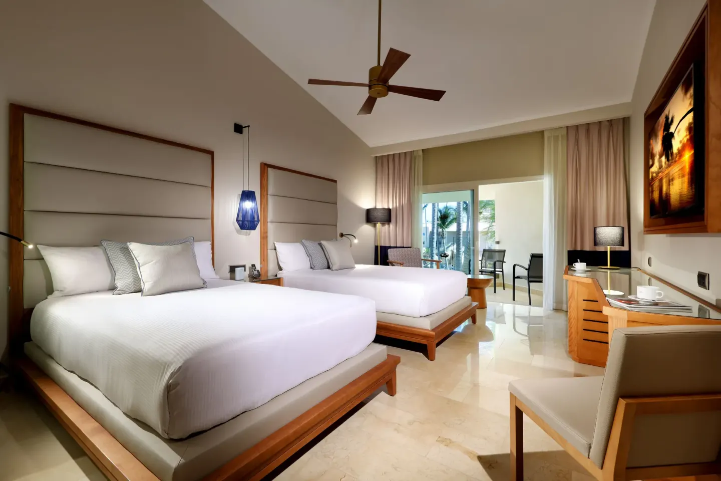 Junior Suite Poolside with two beds and balcony at Grand Palladium Punta Cana Resort & Spa.