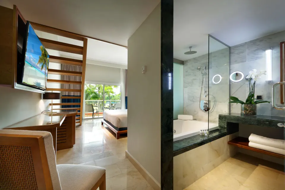 Loft Suite Garden View bathroom and bedroom layout at Grand Palladium Punta Cana Resort & Spa.