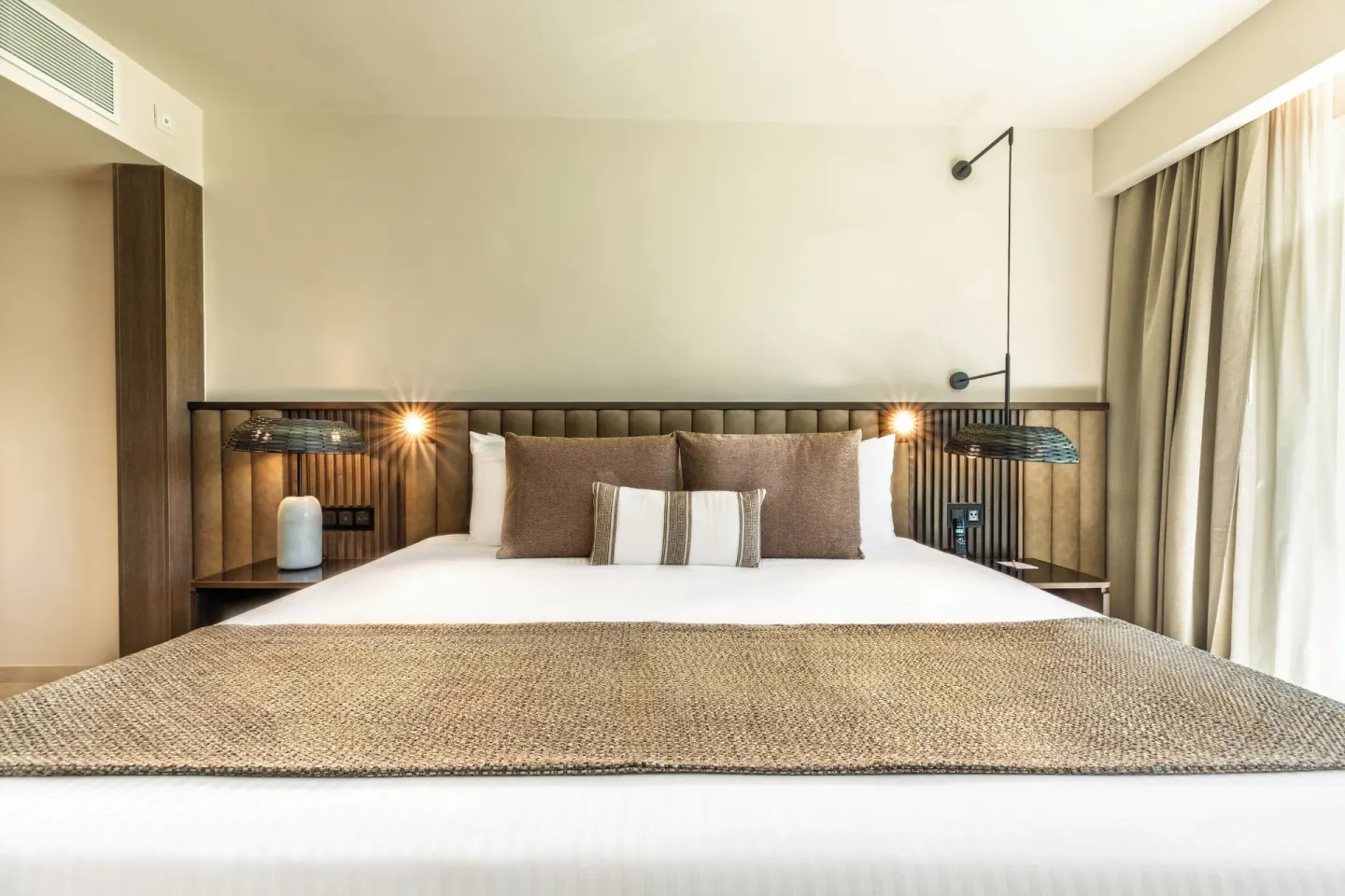 Romance Suite Garden View king bed close-up at Grand Palladium Select Bávaro.
