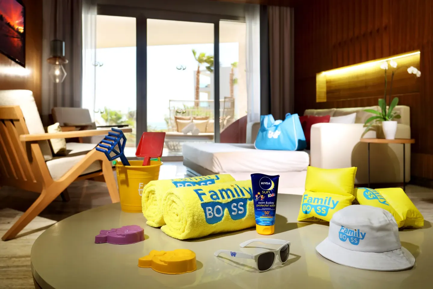 Kids beach items on a table in a family lounge at Grand Palladium Select Costa Mujeres.