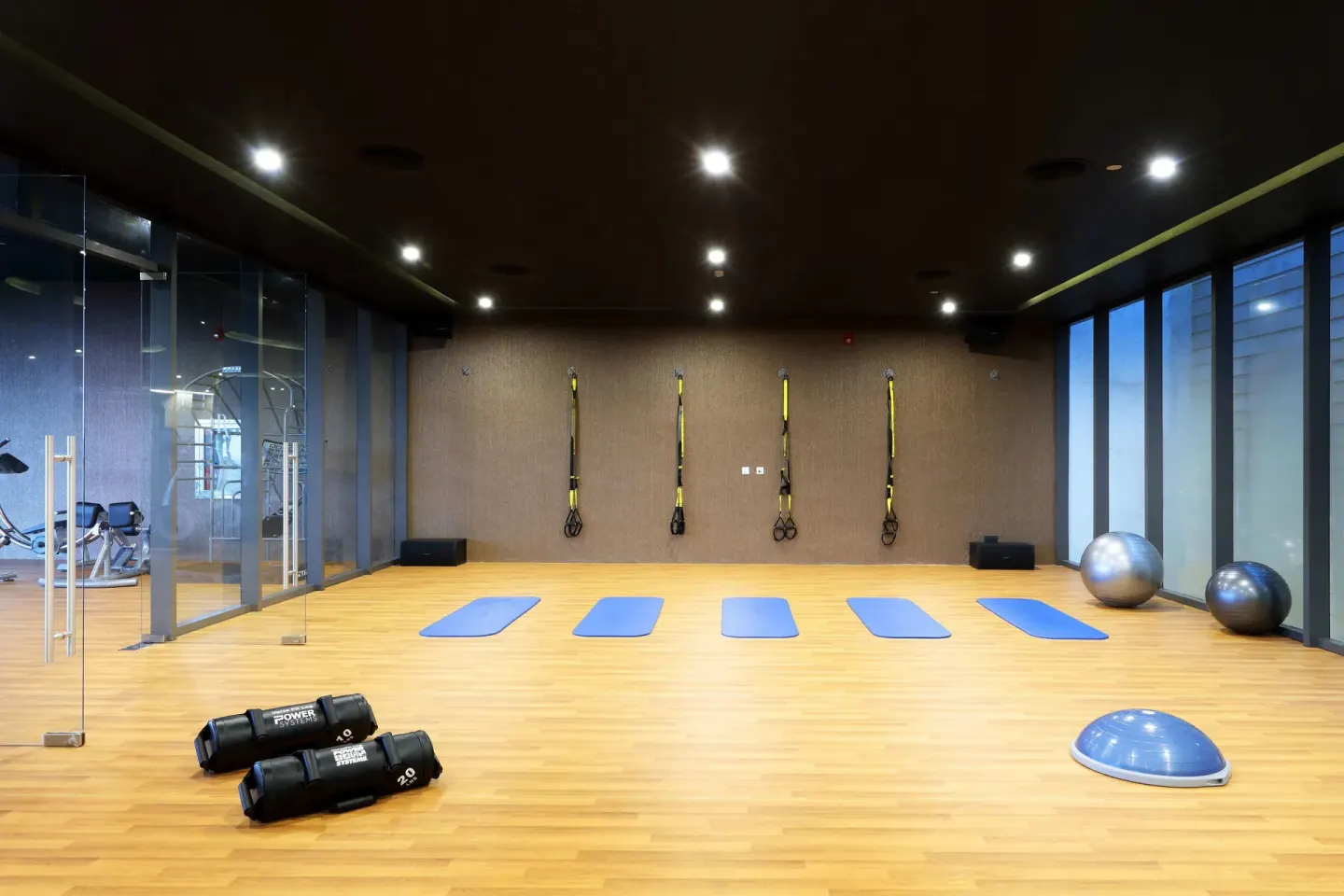 Fitness studio with mats and balance balls at Grand Palladium Select Costa Mujeres.