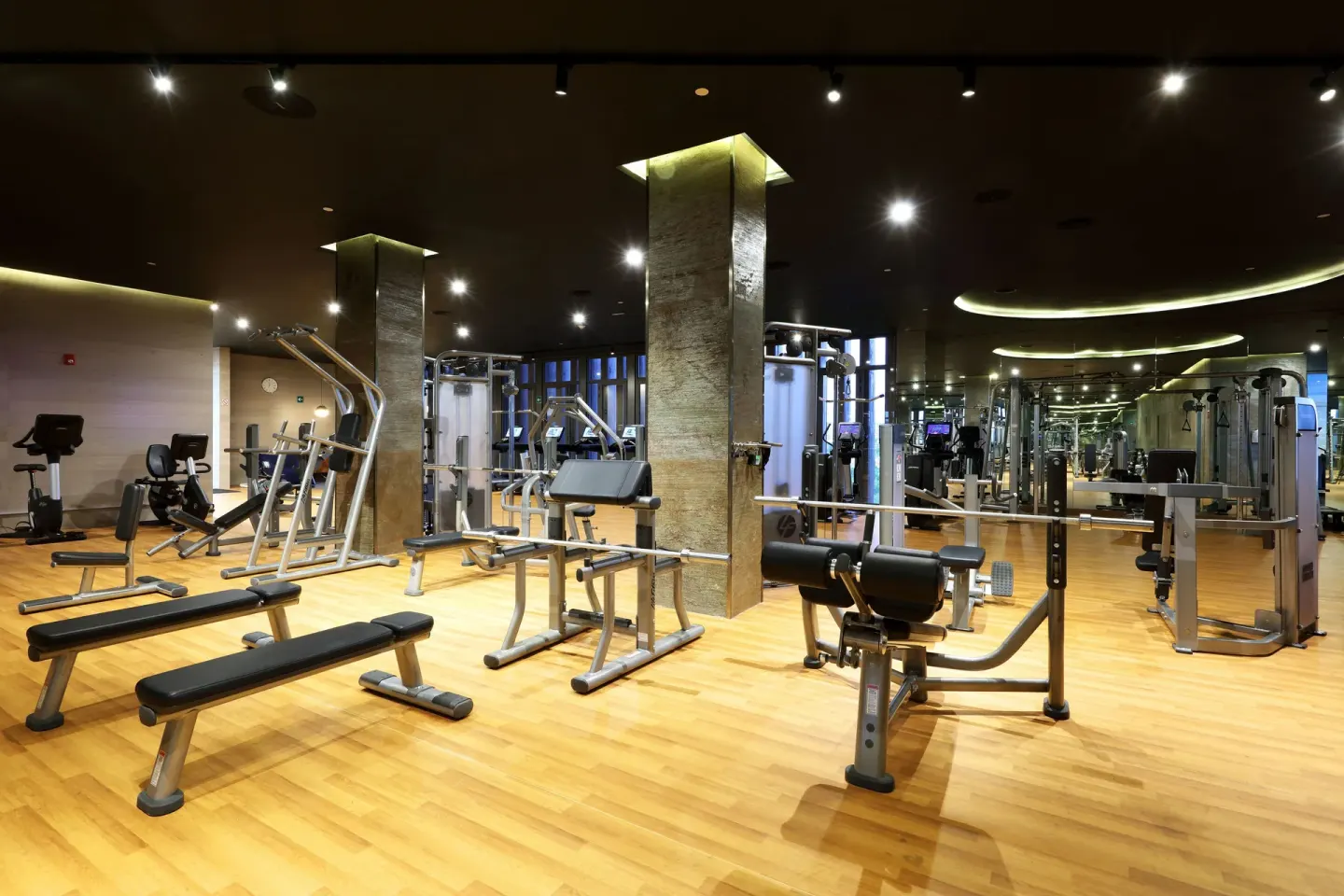 Weight machines and benches fill the gym at Grand Palladium Select Costa Mujeres.