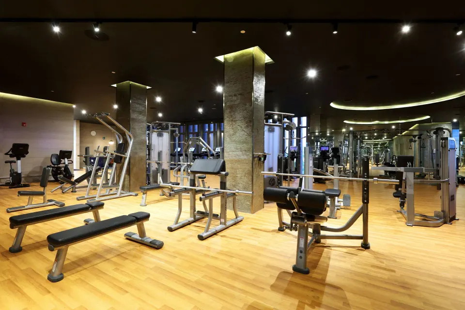 Weight machines and benches fill the gym at Grand Palladium Select Costa Mujeres.