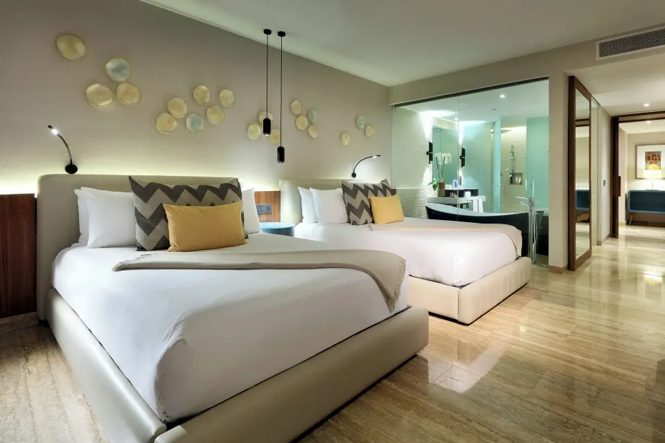 Junior Suite Pool Access with two beds at Grand Palladium Select Costa Mujeres.