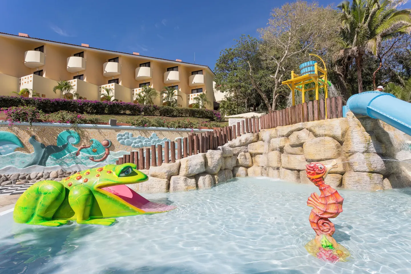 Children’s splash pool with frog and seahorse figures at Grand Palladium Vallarta Resort & Spa.