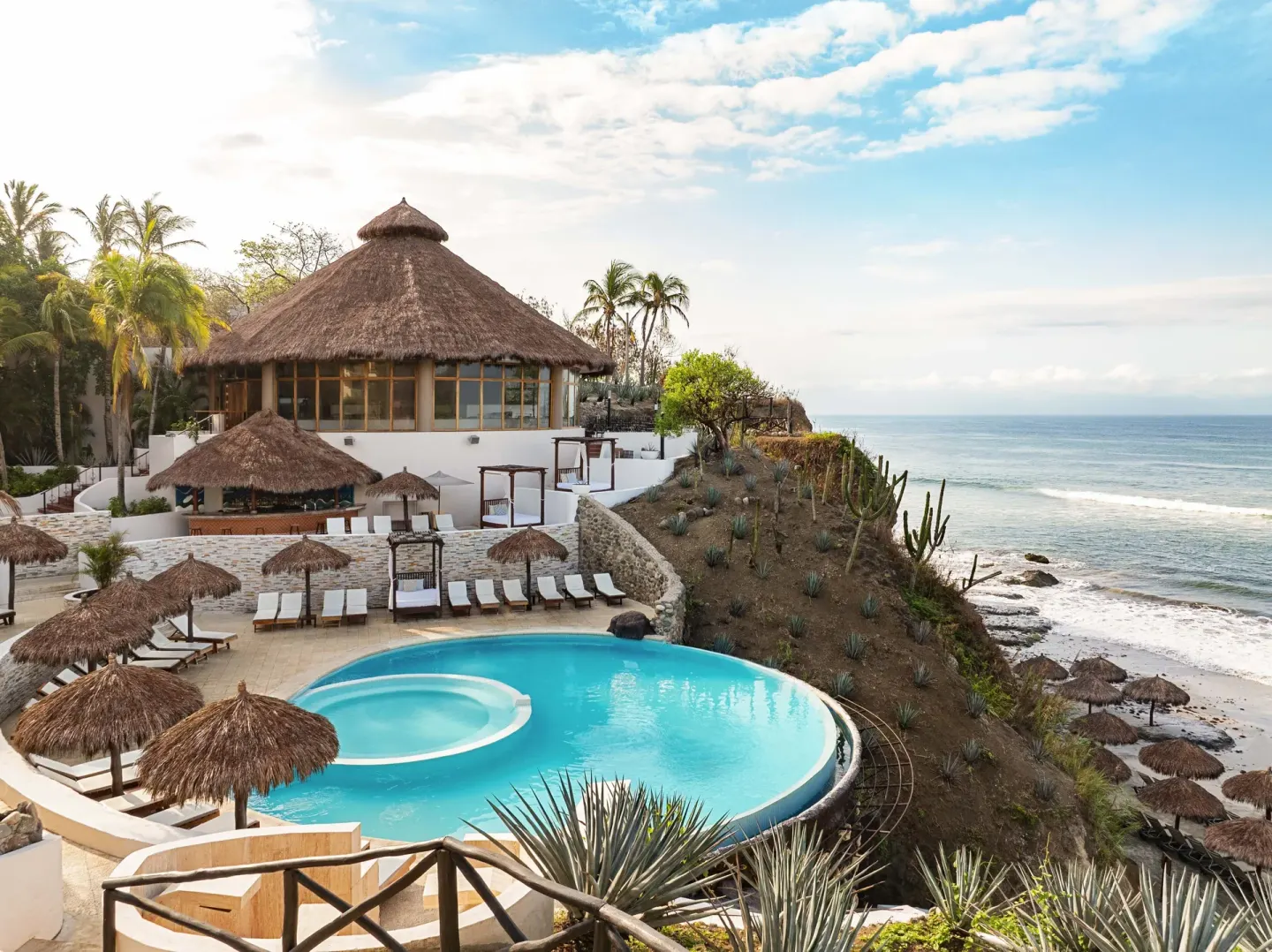 Cliffside pool and ocean at Grand Palladium Vallarta Resort & Spa.