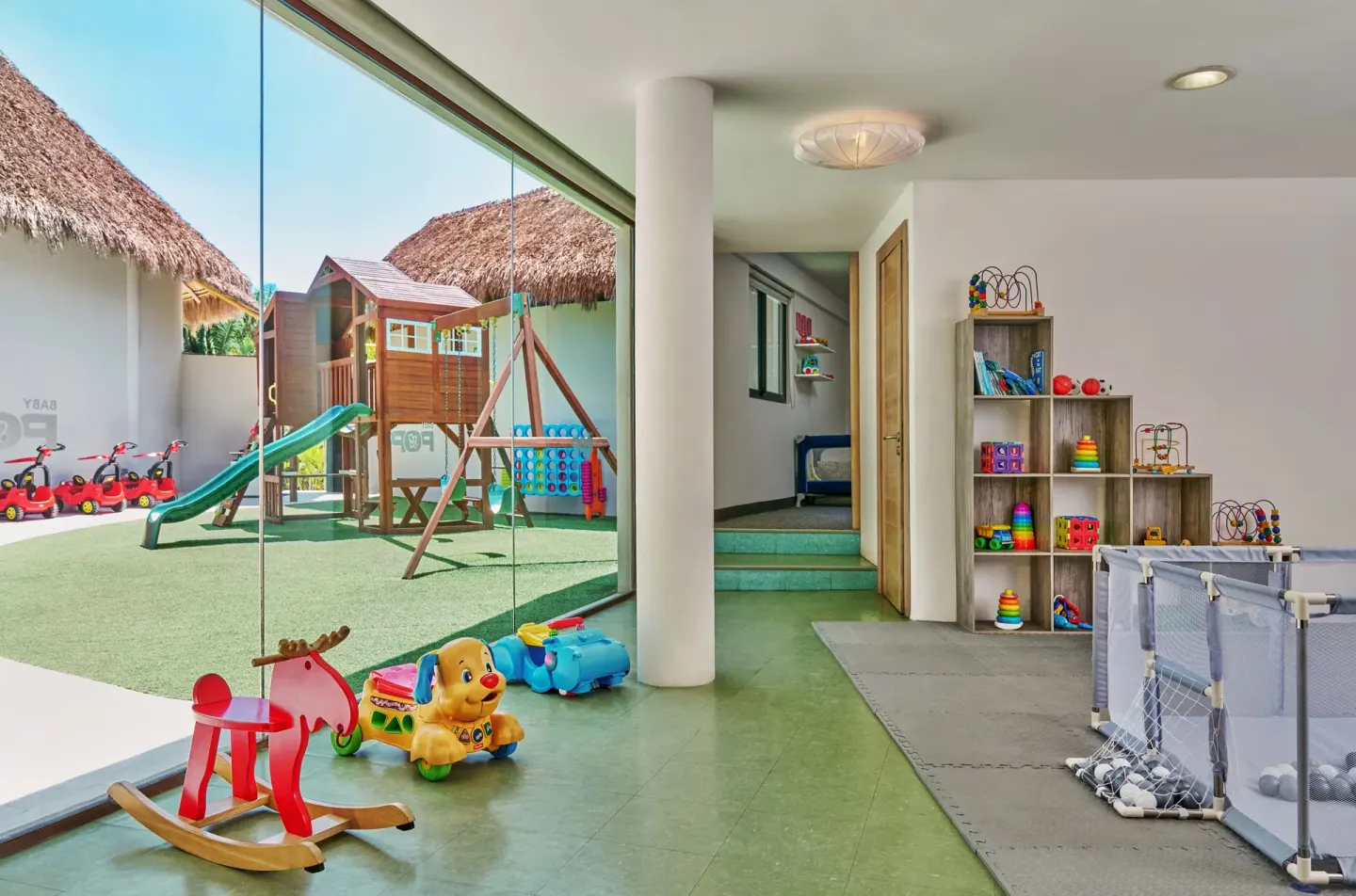Kids club playroom and outdoor playground at Grand Palladium Vallarta Resort & Spa.
