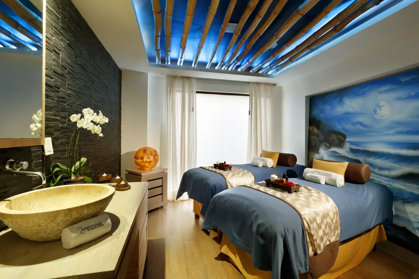 Spa treatment room with two massage beds at Grand Palladium Vallarta Resort & Spa.