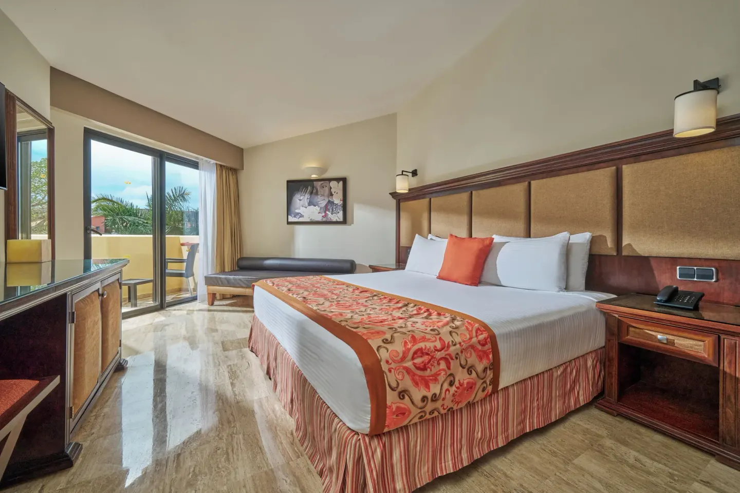 Deluxe Ocean View king room with sofa and balcony at Grand Palladium Vallarta Resort & Spa.