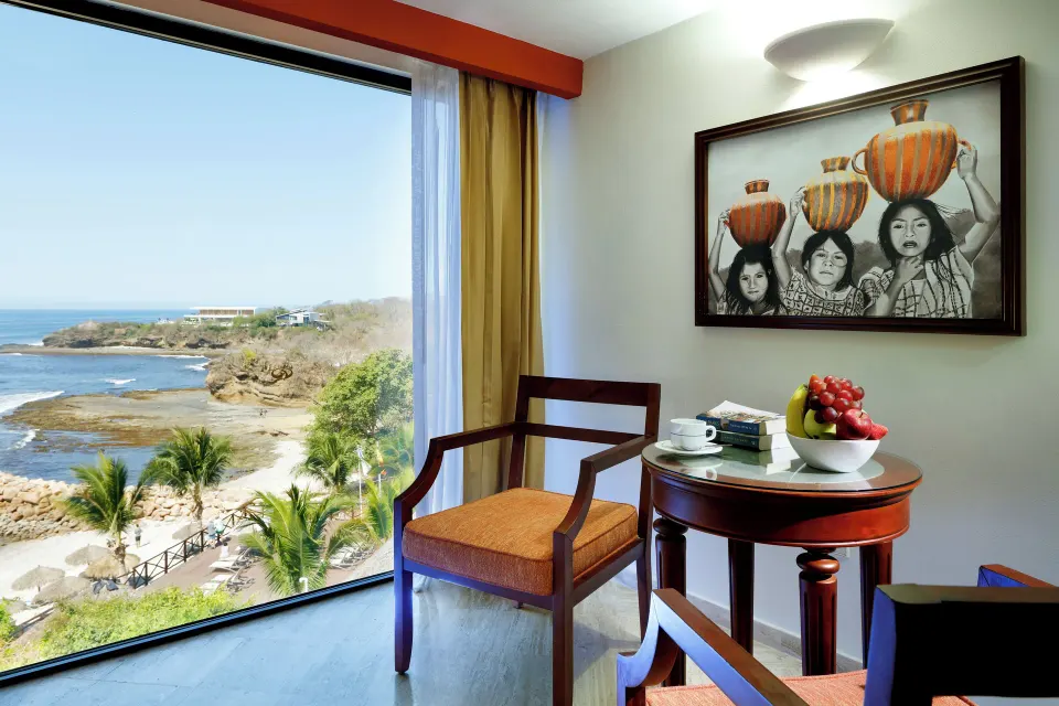 Deluxe Suite Ocean View seating by the window at Grand Palladium Vallarta Resort & Spa.